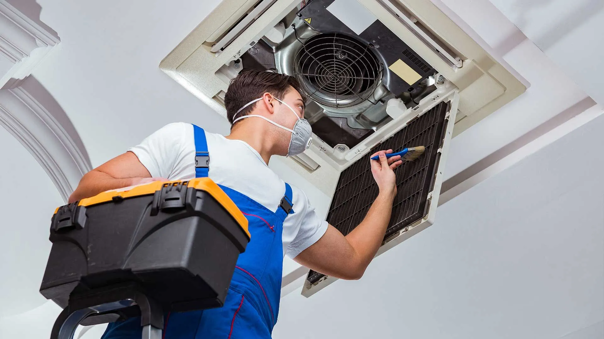 HVAC technician inspecting an outdoor condenser unit during a repair visit.